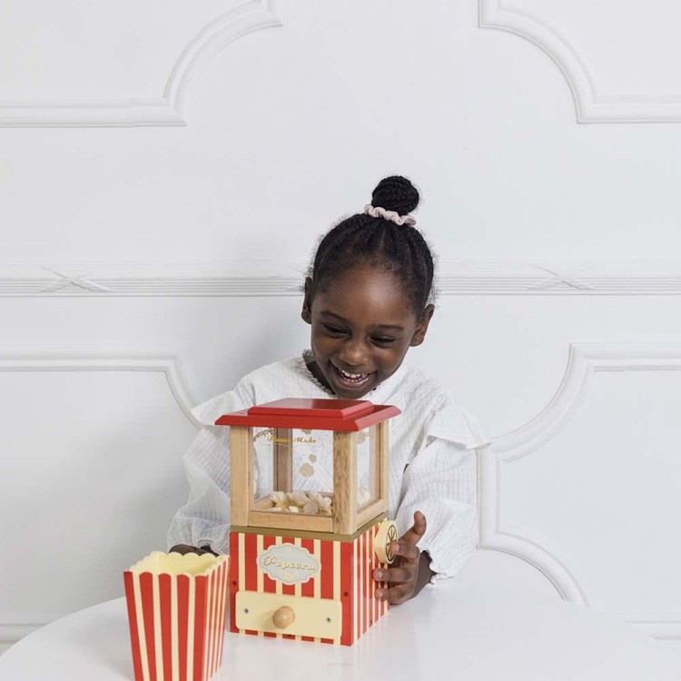 big_TV318-girl-laughing-at-popping-popcorn-machine (1).jpg